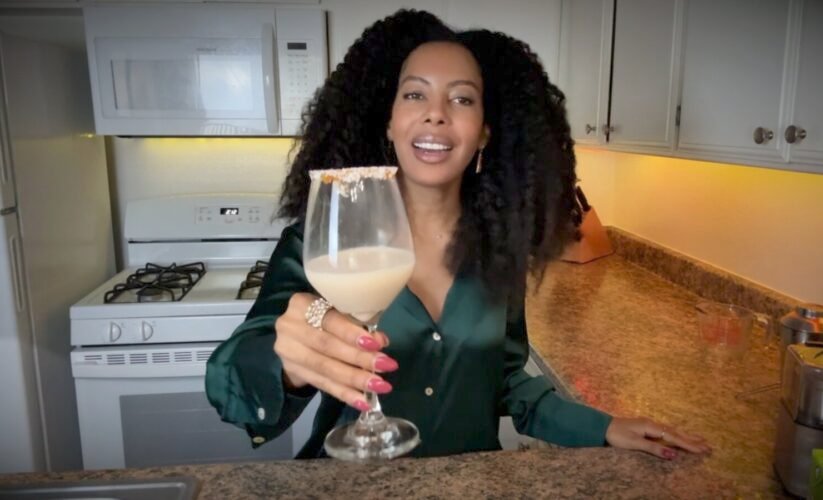 Camille smiling with The Macaroon coconut dessert drink