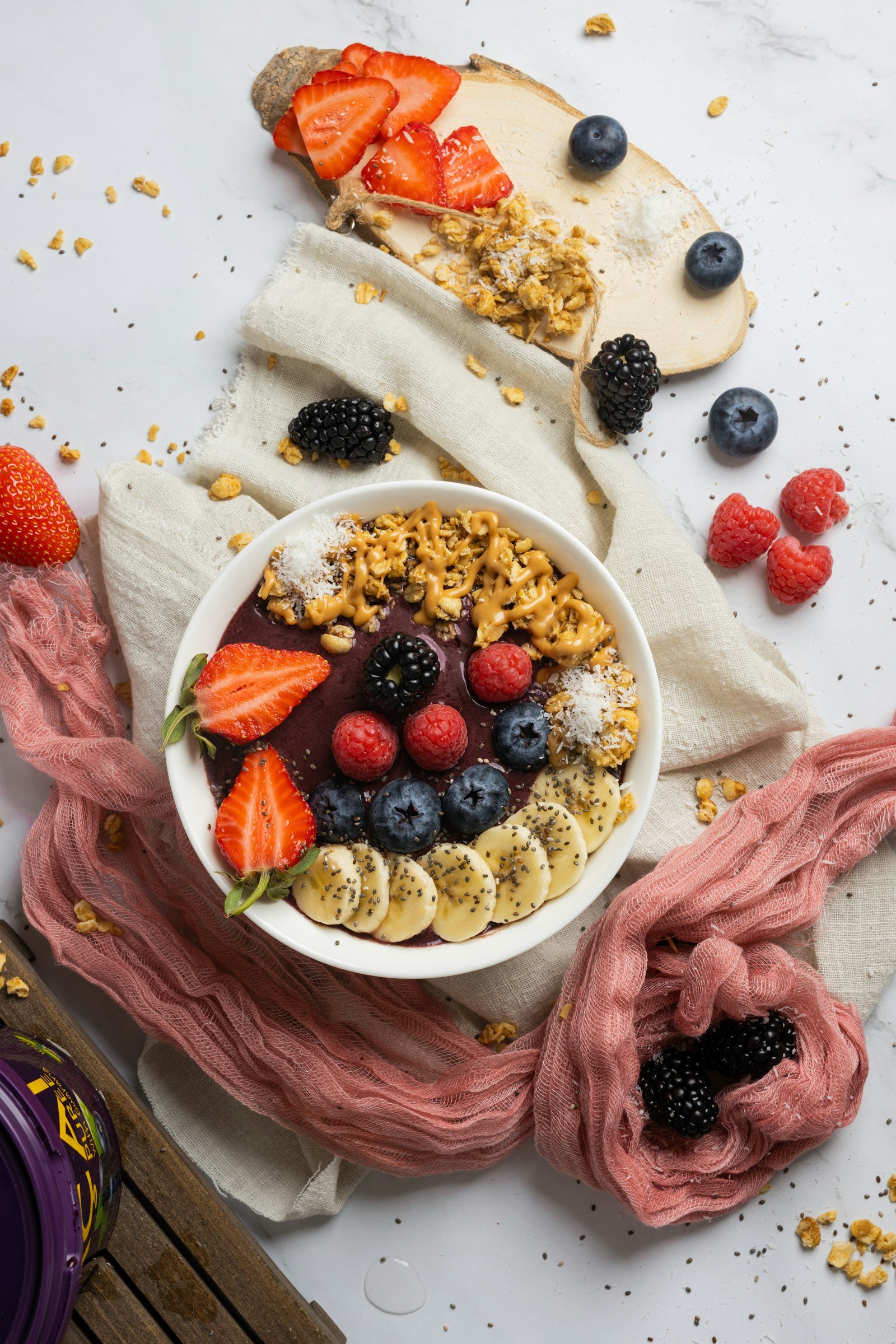 Bowl of granola, berries, and fruit - breakfast category