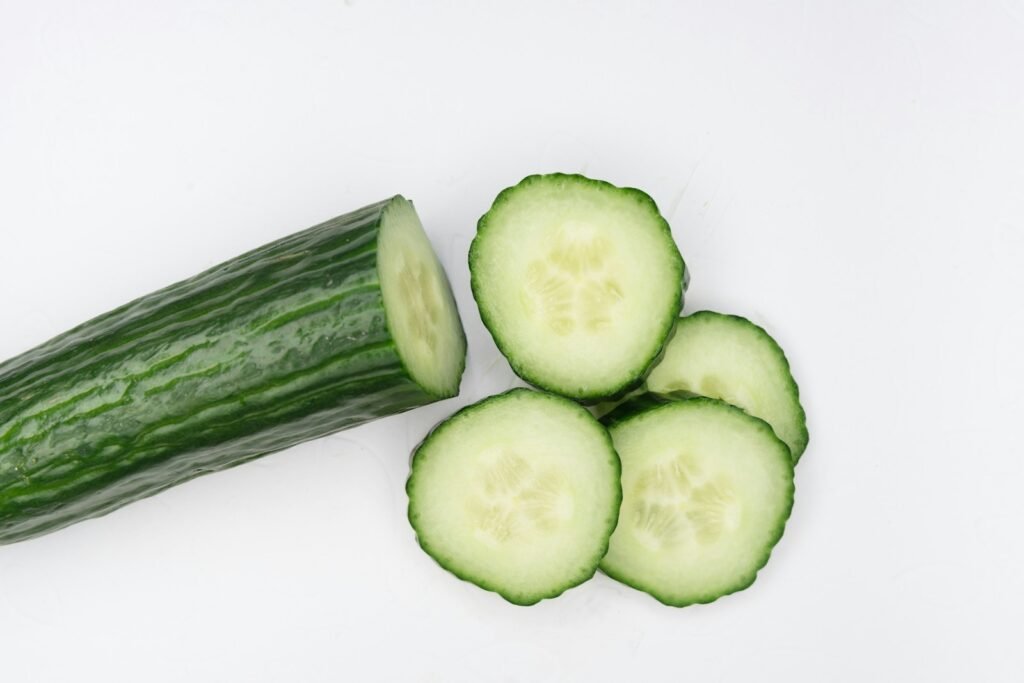 Sliced cucumber on a white background