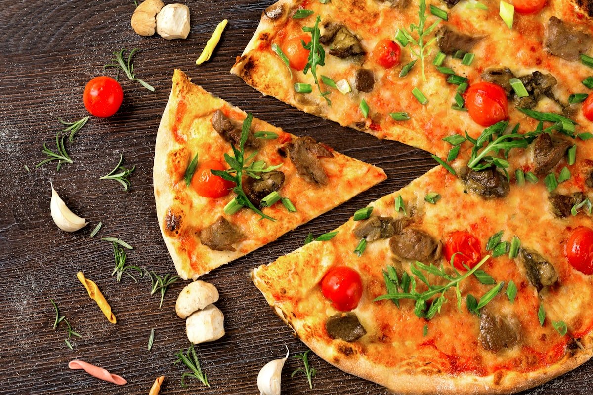 Vegan veggie pizza with fresh tomatoes and basil